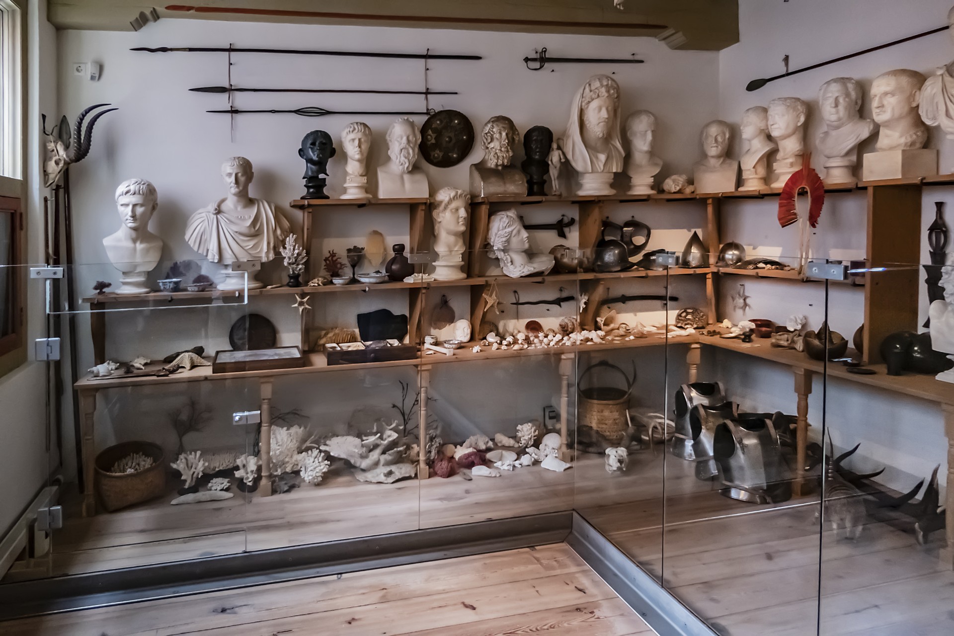 Roman busts, weapons, coral and other artefacts fill the shelves of the Cabinet of Curiousities at Rembrandt's historic house in Amsterdam.