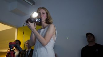 Art and Design Honour student mixed media performance art piece with camera and large screen