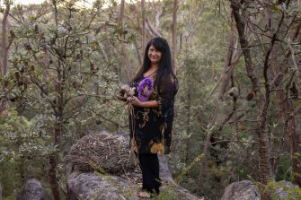 First Nations artis Debra Beale poses in the bush