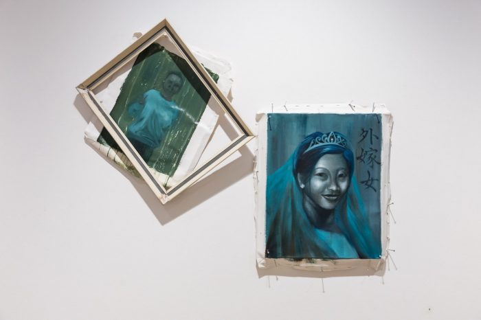 Lok Yin Law, ‘Dinner, in the making’ 2025. Oil on canvas; On table: ‘Just a family reunion’, 134 x 105cm; Wall works: ‘外嫁女 (Married Daughter)’, 40 x 50cm, ‘Wet paint’, 40 x 50cm. 