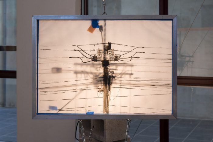 Eric Kang, ‘Leviathan’ (2025). Traditional Korean ink on tracing paper with aluminium frames, wire rope assembly, tape, work lights and concrete blocks; 3 panels: 60cm x 85cm each. Photograph: Anna Kucera.