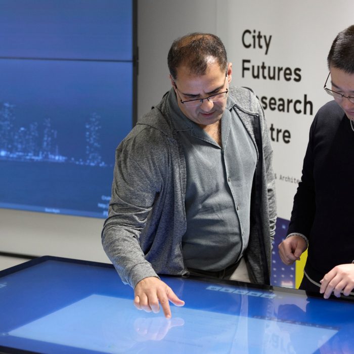 Students using technology in the City Futures Lab at the School of Built Environment