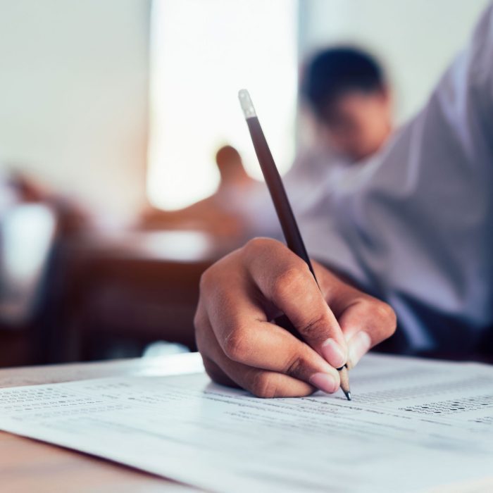 School student is taking exam