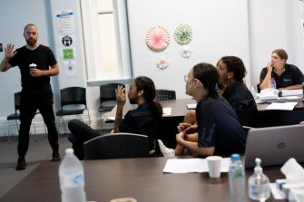 Language tutors being trained in class room
