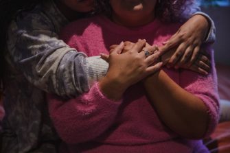 Close up of a young couple hugging - Refinery29 Australia - We Are Many Image Gallery