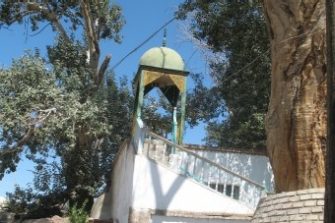 Two folk musicians visiting a Uyghur mähällä in an auto-rickshaw in the early hours of a Ramadan morning (Instruments: Dap and Ghijek). July 2013. Listen here to their music.