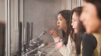 Students learning at the translation booth room at UNSW Kensignton campus.