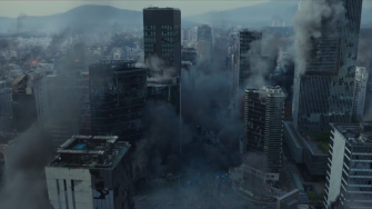 Image of an urban landscape in a mountainous terrain in the immediate aftermath of an earthquake