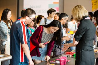 Postgraduate Art and Social Sciences students chat