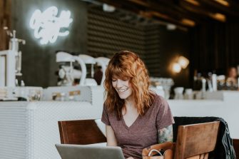 Woman sitting on a chair using a laptop