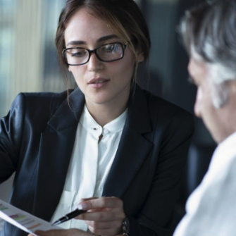 Woman looking at finance document