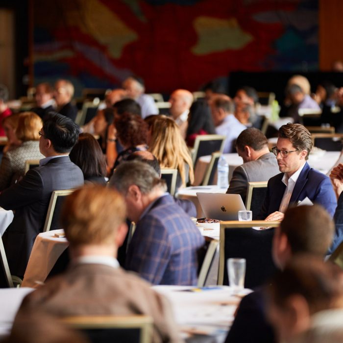 Busines School Conference audience members and speakers