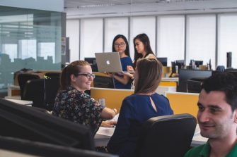 Two women having a discussion in the office