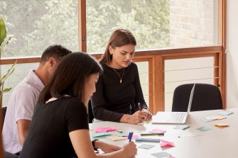 Students discussing social impact at UNSW