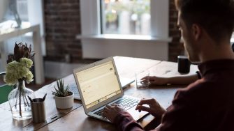 Man at a laptop in an office