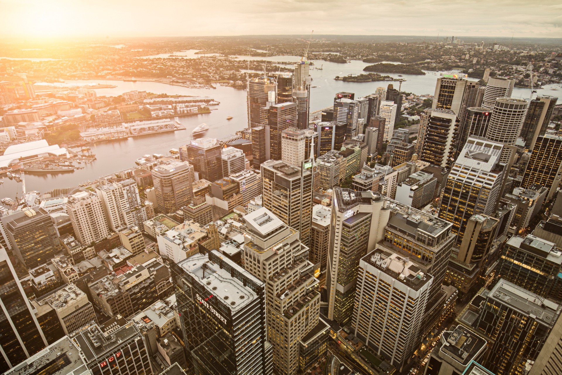 Elevated panorama of downtown Sydney at sunset.