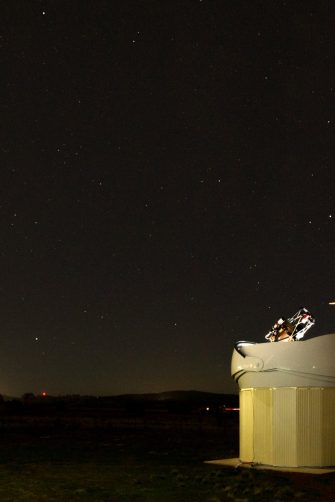 An asteroid in orbit above the Earth