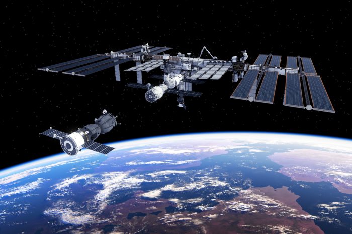 Spacecraft Docked To International Space Station. 3D Illustration.