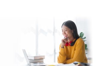 Teen student using tablet, blending study and tech in a yellow-themed lifestyle