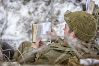 Soldier with bible