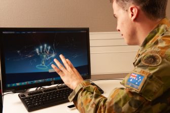 Honours student Officer Cadet Todd Baldwin examines hand gestures as a tool in his experiments concerning impact of presentation and control modalities upon performance and perception within a virtual environment.School of Engineering and Information Technology (SIET) Virtual Environments & Simulation Lab (VESL).