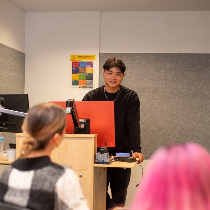 Students doing presentations in a classroom on Paddington Campus