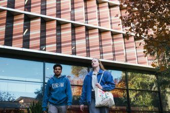 Students walking outside the Ainsworth Building