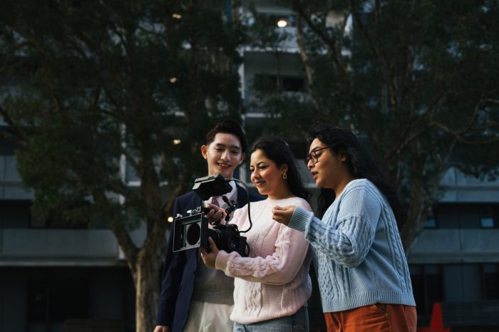 Students using video equipment on campus