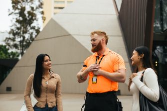 Students talking to Security on campus