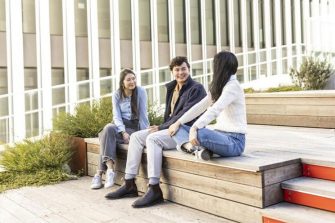 Law and Justice students chatting on campus
