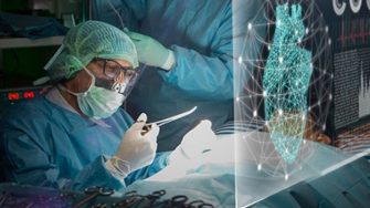 A surgeon operating on a patient with a projection of a heart in front of him
