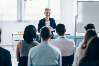 Businesswoman leading a training class for professionals