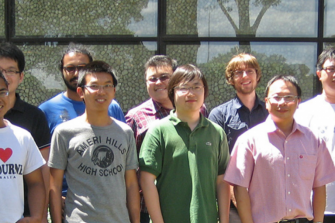 group of people in front of Chemical school building