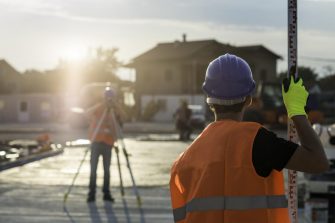 Surveyors in hard hats