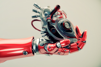 Robot's hand holds robotic heart