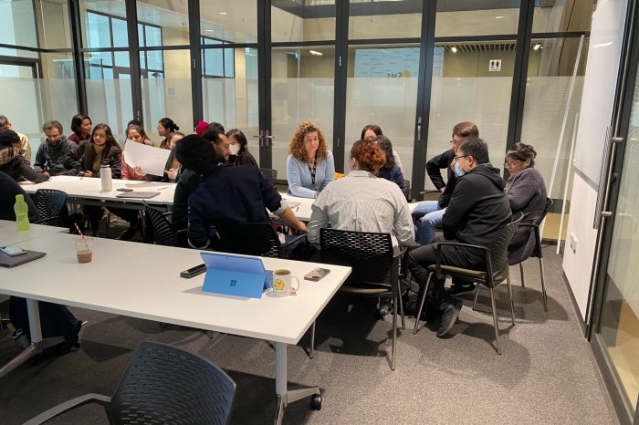 Photo of room with team