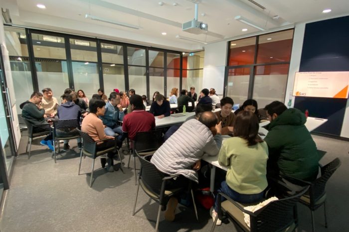 Photo of room with team