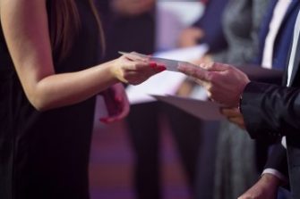 Student receiving a certificate at an award ceremony