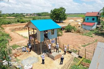 Engineering students building a house in Cambodia