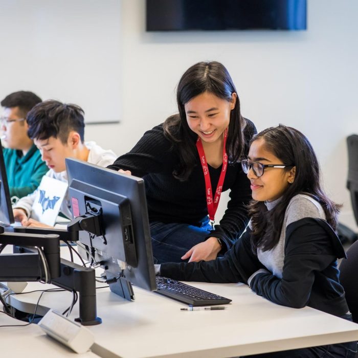 Students and teacher in a computer lab