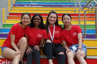 eng students on colourful steps
