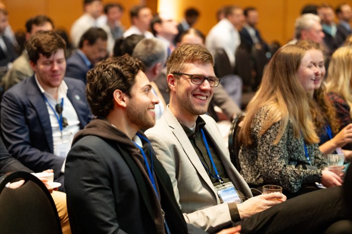 Conference attendees seated.