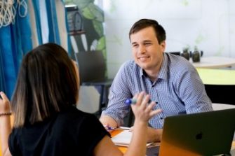 Student and mentor having a conversation