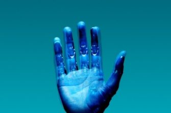 shot of hand with blue filter