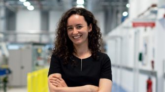 female engineer smiling in lab