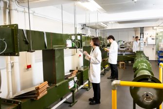 Two students at work in the Mine Ventilation Laboratory