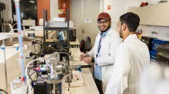Two happy students at the Multiphysics Geomechanics Laboratory