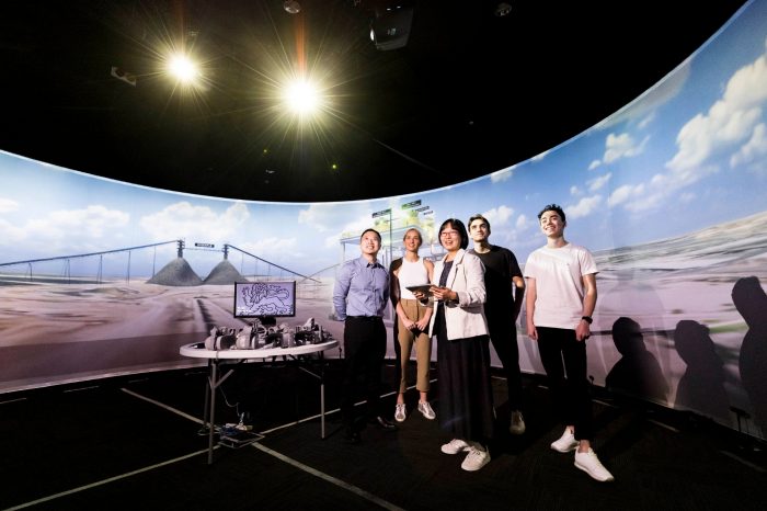 Students working with 360 Degree VR Simulator