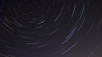A time lapse photo of a starry sky