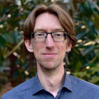 Headshot of Dr Phil James